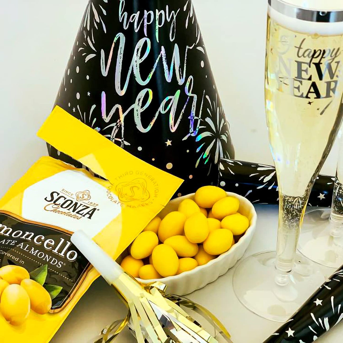 Lemoncello Chocolate Covered Almonds Brought to you by Nutic, Produced by Sconza - Roasted Almond Covered in White Chocolate and
