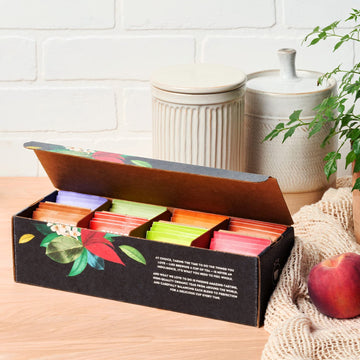 Choice Organic Teas Sipping Box Tea Sampler  Variety Gift Box  32 Total Tea Bags  8 Flavors  Caffeinated and Caffeine-Free Teas  Sustainably Sourced Organic and Non-GMO Ingredients