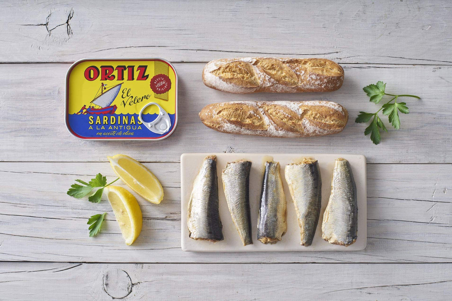 Ortiz Sardines A la Antiqua  Old Style   Moist and Tender  Wild Caught in Sdiscomfort-reducing and Hand-Packed in enhanced Extra Virgin Olive Oil  Enjoy in Salads  Sandwiches and on Toast  4.9oz Can (Pack of 8)