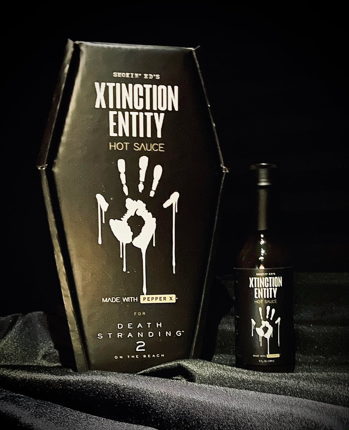 Puckerbutt x Smokin Eds Xtinction Entity Pepper X Hot Sauce Gift Box (Playstations Death Stranding 2)